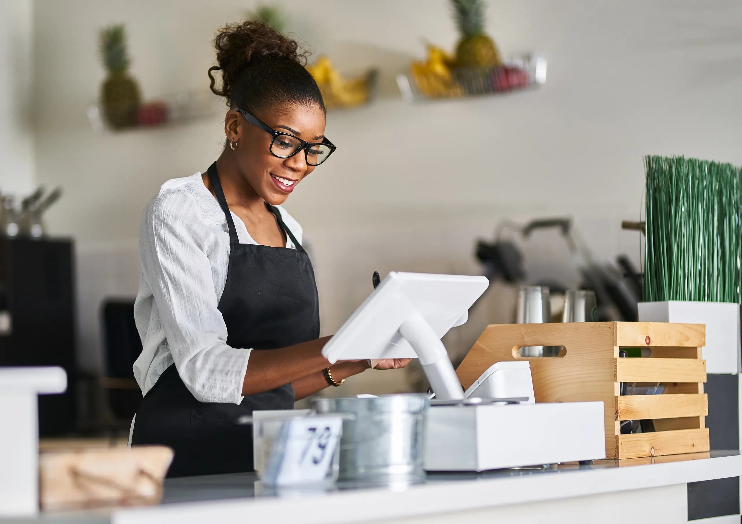 Happy Woman working on Pos