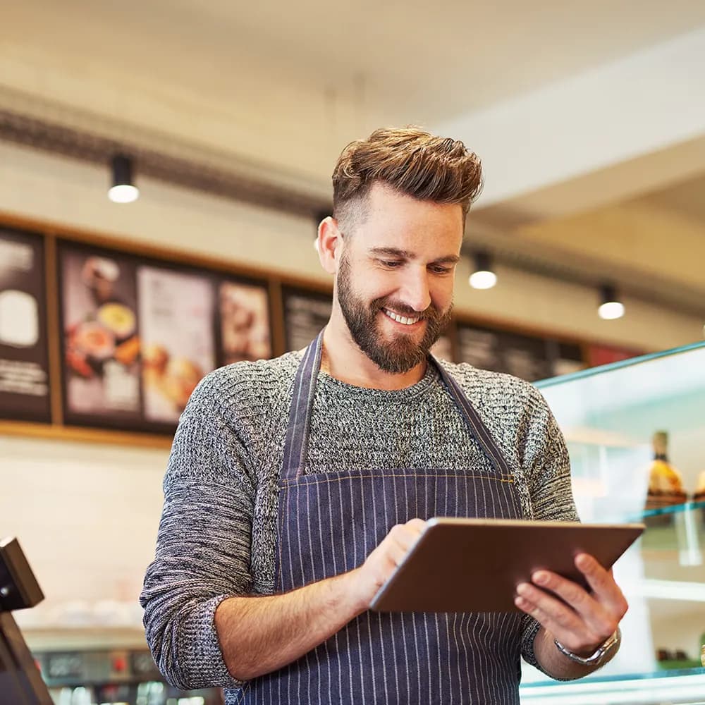 Waiter using tab