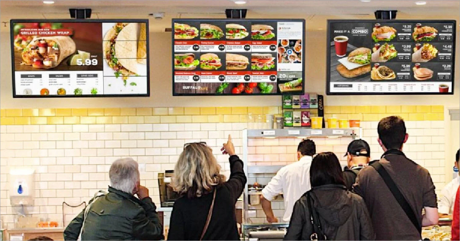 Overhead menu boards in a QSR