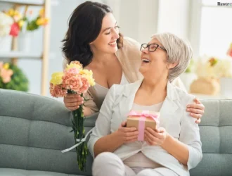 A mother daughter smiling at each other