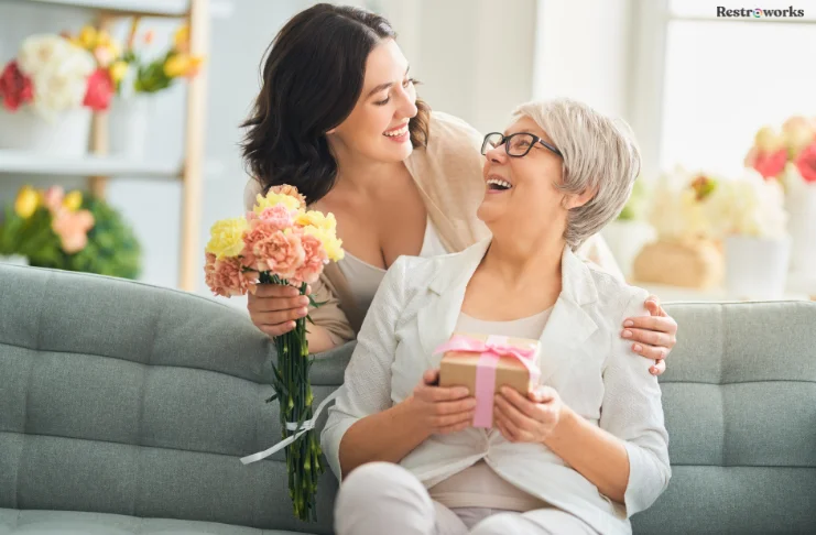 A mother daughter smiling at each other