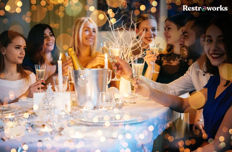 A gathering celebrating at a restaurant.