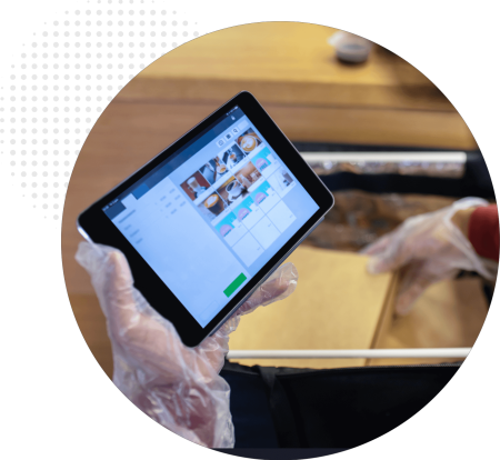 Restaurant staff using tablet ordering system