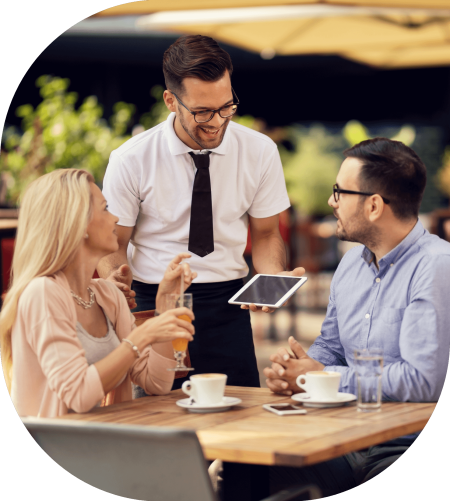 Restaurant staff taking orders through tablet ordering system